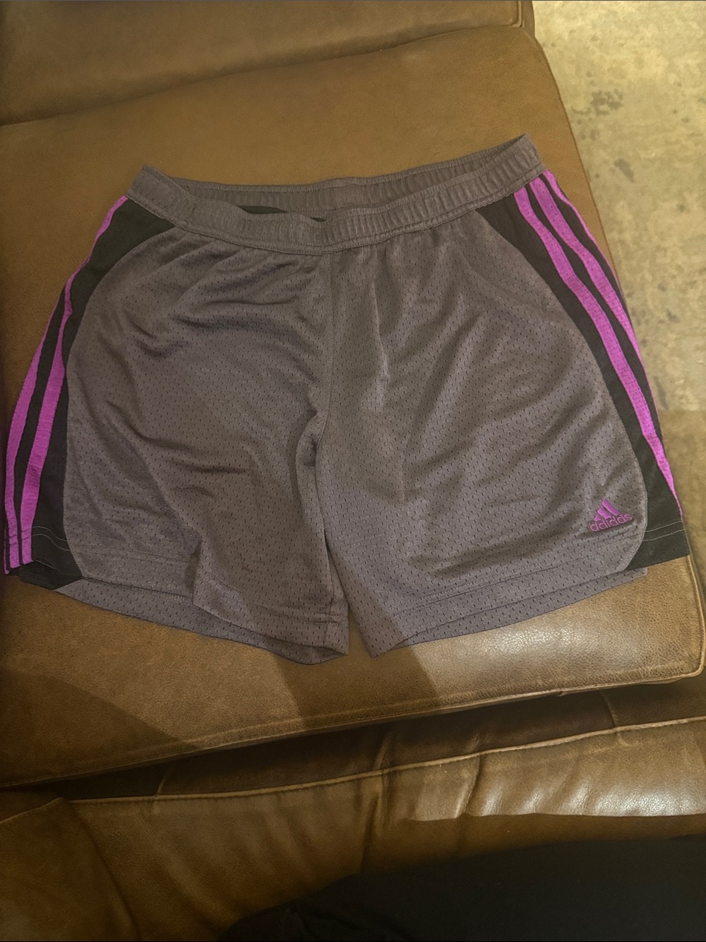 Adidas Women’s Gray Athletic Shorts with Magenta & Black side stripes.
